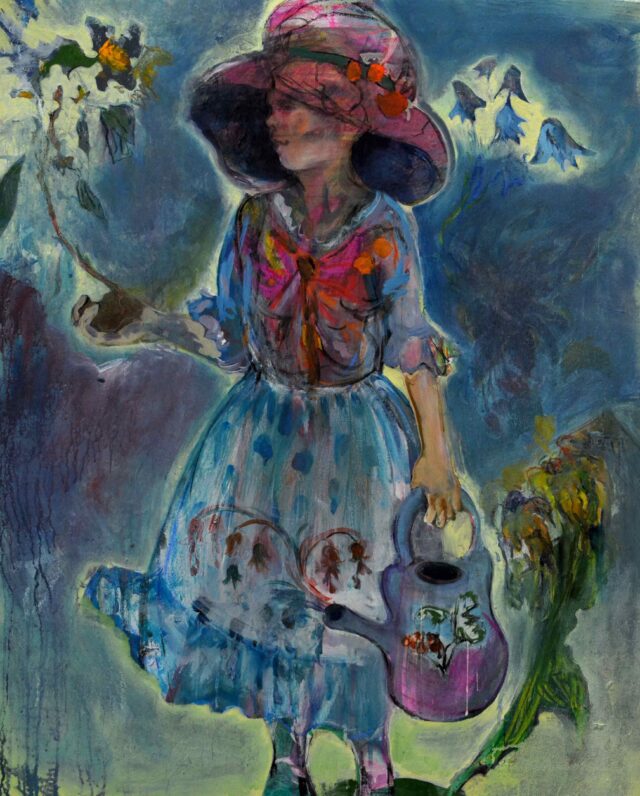 Woman in a hat and a wateing can